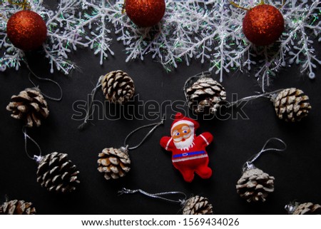 Decorative Christmas and santa claus isolated on black background