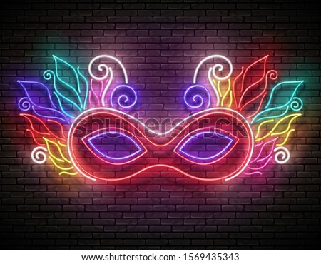 Glow Greeting Card with Masquerade Mask. Venetian, Brazilian Carnival. Shiny Neon Holiday Poster, Flyer, Banner, Postcard, Night Club Invitation. Brick Wall. Vector 3d Illustration.Clipping Mask