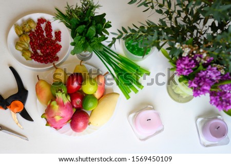 photo from a series of pictures about the process of forming a fruit and flower bouquet. tutorial, do it yourself. photo 4, prepared fruits, berries, flowers and tools on the table, top view