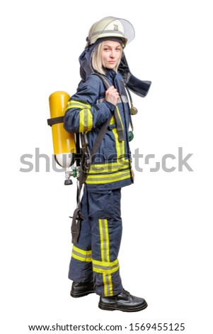 Young woman firefighter wearing uniform and helmet with air pack on her back isolated on a white background