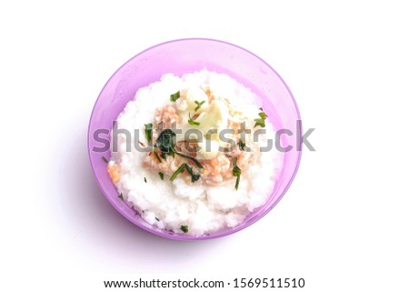 A flatlay picture of baby fish porride on isolated white background.