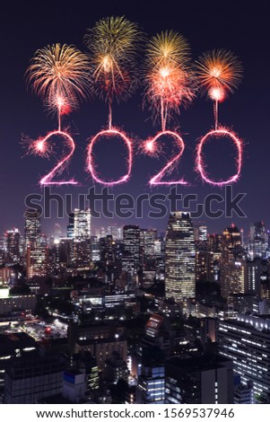 2020 happy new year fireworks celebrating over Tokyo cityscape at night, Japan