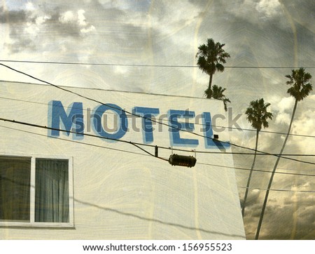aged and worn vintage photo of motel with palm trees