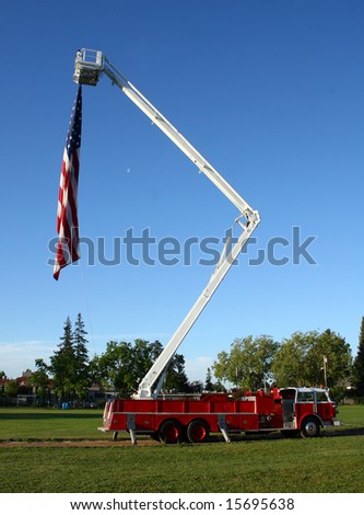 fire truck holding a flag