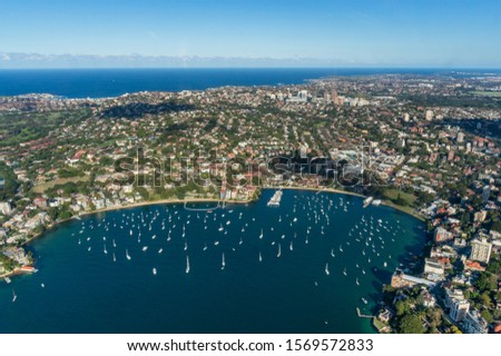 Aerial view of Sydney darling Point coastal suburbs with double Bay with yachts and luxury waterfront property. Modern city view from above with lagoon, bay. Wealthy districts aerial photo panorama 