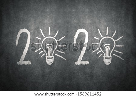 New year 2020 bright ideas concept on blackboard background