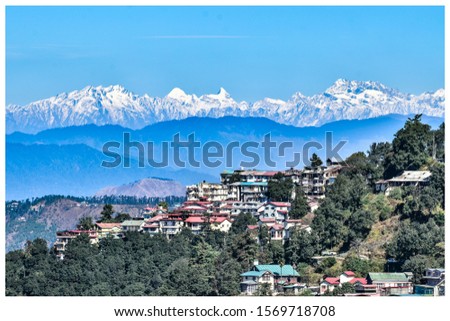 View from the Ridge Shimla. Shimla is capital city of Himchal Pradesh, state of India. It is loacted in Himalayan foothills and is favorite tourist destination.It used to Summer capital in British era Royalty-Free Stock Photo #1569718708