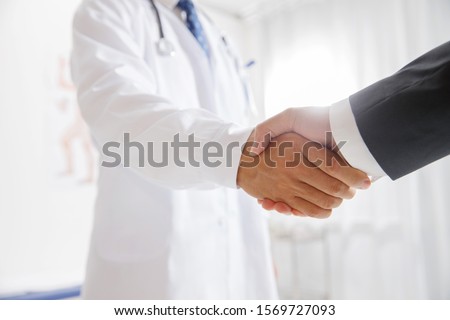 Doctors and patients to shake hands