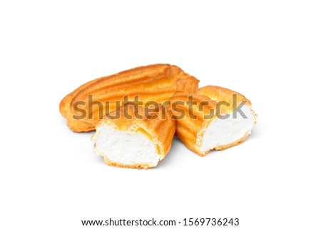 Eclairs with white cream isolated on white background.
