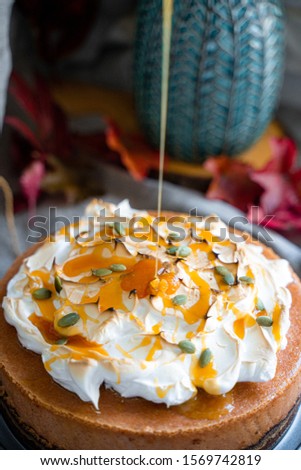 Pumpkin Cake with Meringue, Pumpkin Seeds and Caramel Sauce