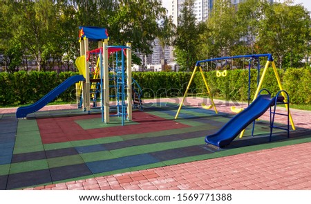 Children's playground, swing, slide, stairs. A place for children to play. Gymnastics children's sports playground.