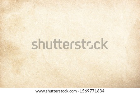 Old vintage paper with a glowing center and grunge vignette. Royalty-Free Stock Photo #1569771634