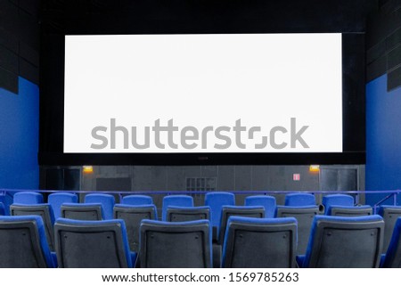large Billboard in the form of a cinema monitor, convey information through the screen in the cinema hall. large advertising layout. Royalty-Free Stock Photo #1569785263