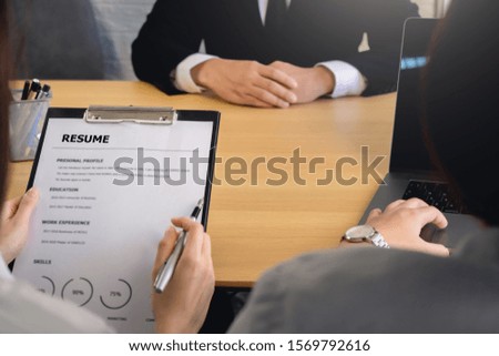 Close up of employer arriving for a job interview in office. Quality employment concepts.