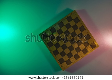 Beautiful vintage Chess board in the color light. Background banner texture. Top View.