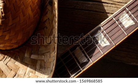  vintage electric guitar on the wooden boards closeup                              