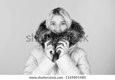 comfortable. girl in puffed coat. faux fur fashion. beauty in winter clothing. cold season shopping. flu and cold. seasonal fashion. happy winter holidays. woman in padded warm coat.