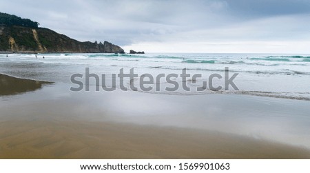 Panoramic view at sunset and without people of Aguilar Beach in Cantabria in Spain