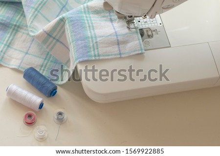 Sewing machine part, fabric, threads and accessories for sewing close-up