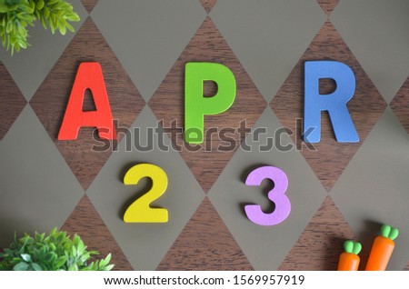 April 23, Birthday for kids with colorful wooden text design for background.