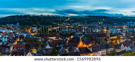 Germany, XXL aerial panorama view above houses, st dionysius church and skyline of medieval city esslingen am neckar at sunset