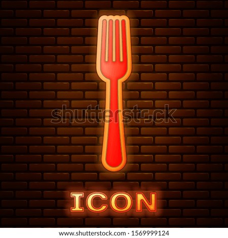 Glowing neon Fork icon isolated on brick wall background. Cutlery symbol.  Vector Illustration