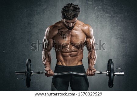 Handsome Muscular Men Lifting Weights Royalty-Free Stock Photo #1570029529
