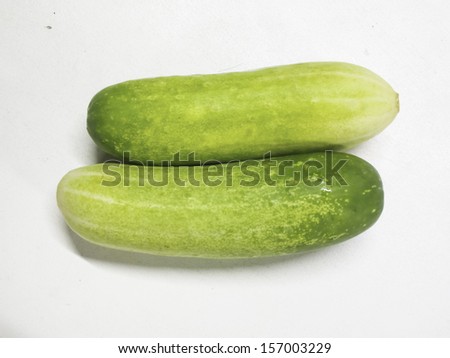 two cucumbers on white background