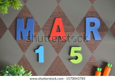 March 15, Birthday for kids with wooden text design for background.
