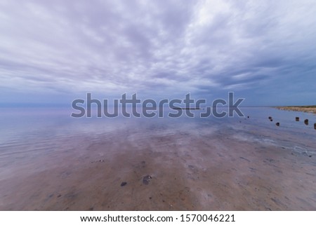 Lake Elton with clouds, in cloudy weather but without wind and smooth, even water