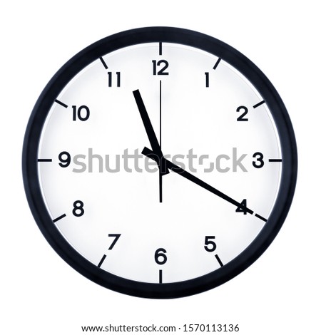 Classic analog clock pointing at eleven twenty, isolated on white background. Royalty-Free Stock Photo #1570113136