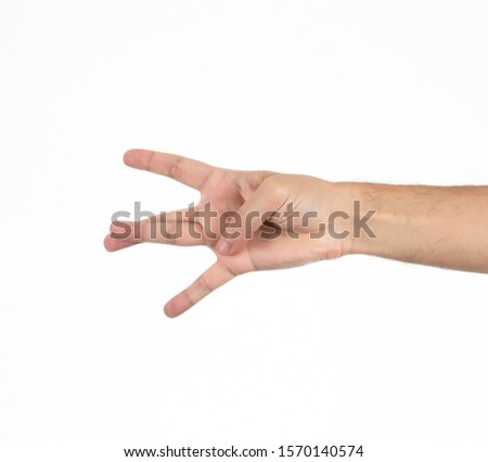 Closeup of male hand showing west side sign isolated on white background