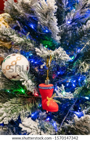 Christmas tree decorations with colorful objects
