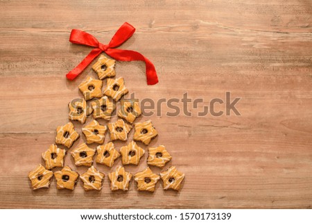 Cookie tree with red bow.Christmas background.