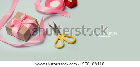 Process of packaging parcels and gift boxes. Ribbons and scissors. Light dirty mint background. Web article template. Long header banner format. Sale coupon. Visit card. Your information. Text space.
