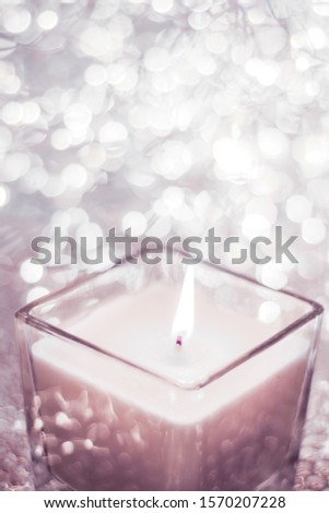 Festive decoration, branding and aromatherapy spa concept - Blush pink aromatic candle on Christmas and New Years glitter background, Valentines Day luxury home decor and holiday season brand design