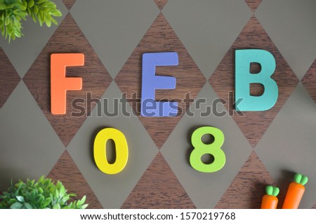 February 8, Birthday for kids with wooden text design for background.