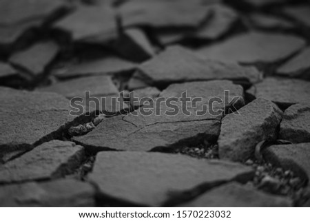 Surface made of natural wild stones, bw photo