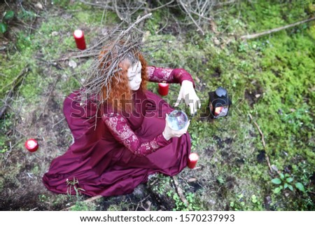 Witch holds a ritual in the depths of the forest
