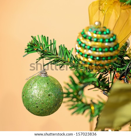 detail of a green and gold Christmas tree