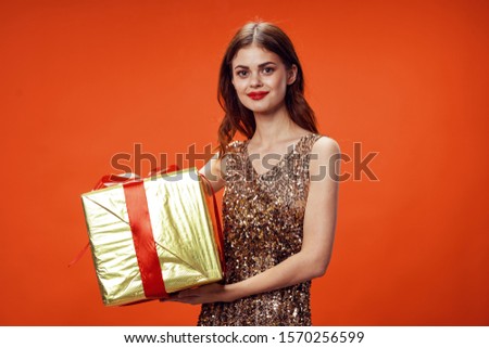 Gift box woman in sequin dress