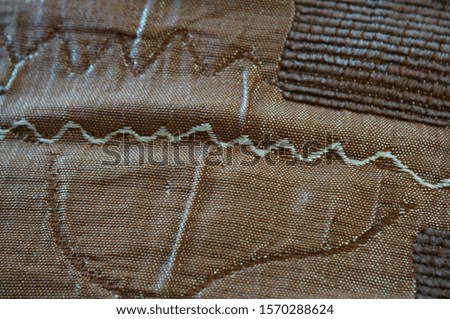 Close-up photo of fabric products. Colored background. Textures.