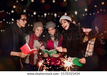 Posada Mexicana, Mexican friends Singing carols in Christmas in Mexico Royalty-Free Stock Photo #1570325434