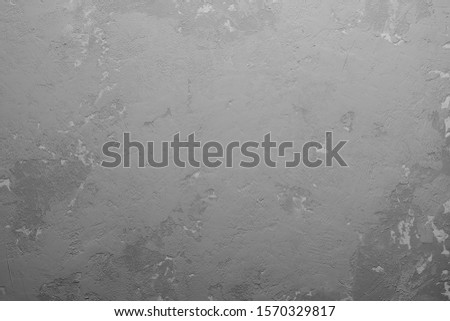 Gray textured surface of concrete and cement closeup.