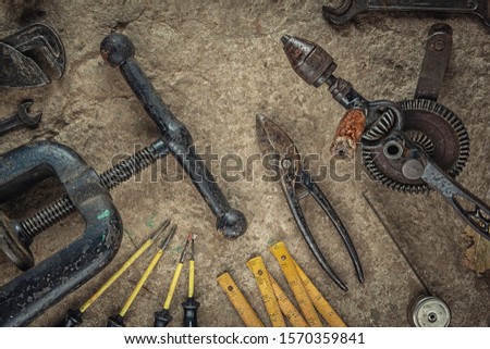 collection of old craft tools, still life with rusty tools, product photography for industry 