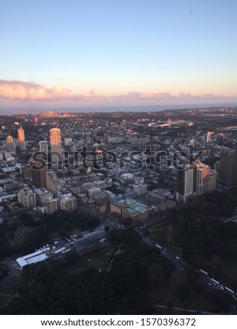 A view from the Sydney Skytower looking down upon the city at sunset.
