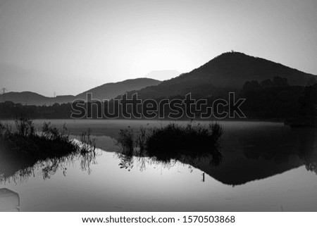 black and white mountain on lake_reflection picture
