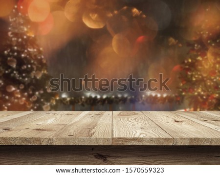 Wooden desk on blur or abstract background