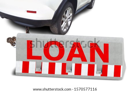 red loan lettering on concrete road barrier linked to modern car by metal chain isolated on white background. Closeup view of vehicle and road block. Mixed media. Bank loans financial business theme