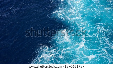 
Bright color of sea water. The texture of the water. Natural background.